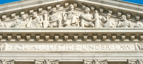 Closeup of architectural details on the Supreme Court of the United States.